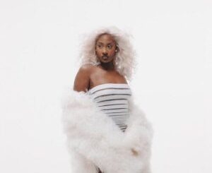 Nigerian Star Tems Partners with Luxury Watch Brand OMEGA